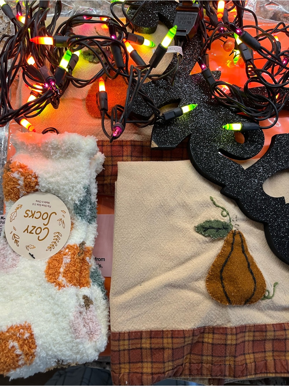 Halloween / seasonal decor: lights, nwt socks, door sign, dish towels,nwt covers
